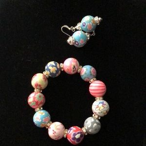 Colorful clay resin 6” stretch bracelet and earrings. Will sell separately.